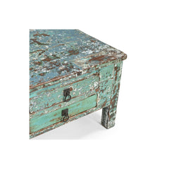 Corner of the coffee table showing the 2 drawers on a white background