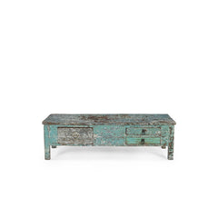 Vintage-style wooden coffee table with a distressed finish on a white background