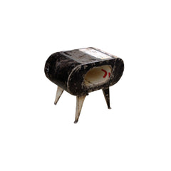 Vintage-style stool with a cylindrical seat and white legs on a white background