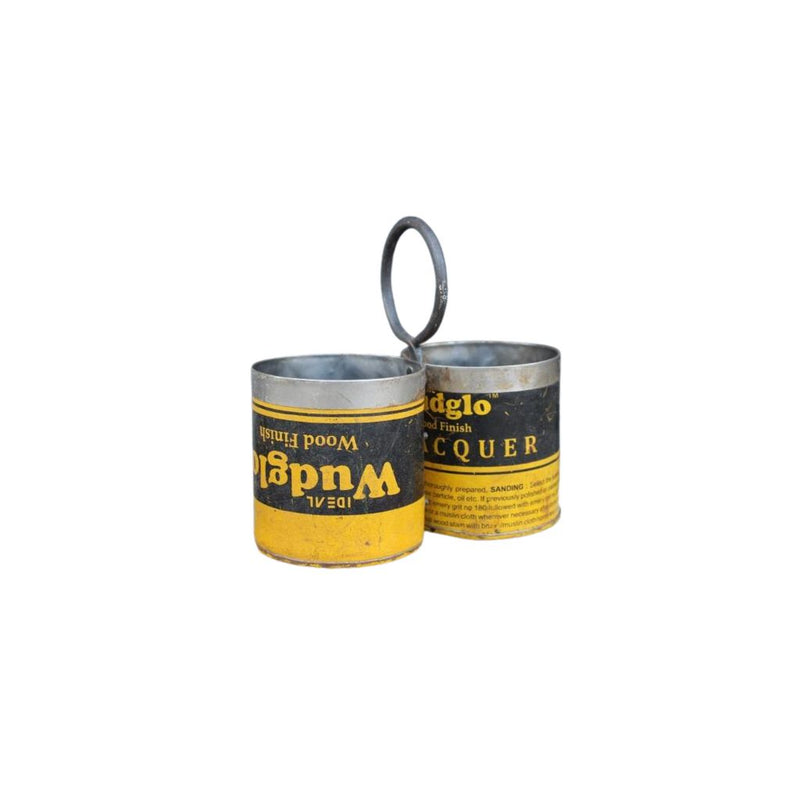 double pots made of recycled metal with a handle and yellow & black writing