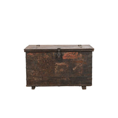 A rustic, weathered dark brown wooden storage chest with a metal latch and hinges, isolated on a white background.