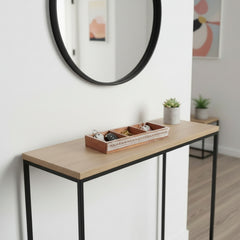 wooden tray with 3 compartments on a console in an entrance in a modern style interior