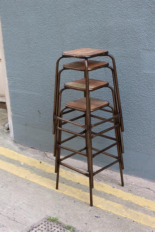 Bistro Counter Stool Stacked in 5 outside