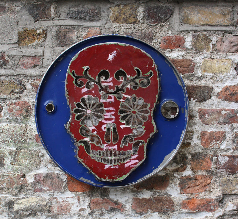 Cubamista mexican skull outside with blue face and dark red background front view 