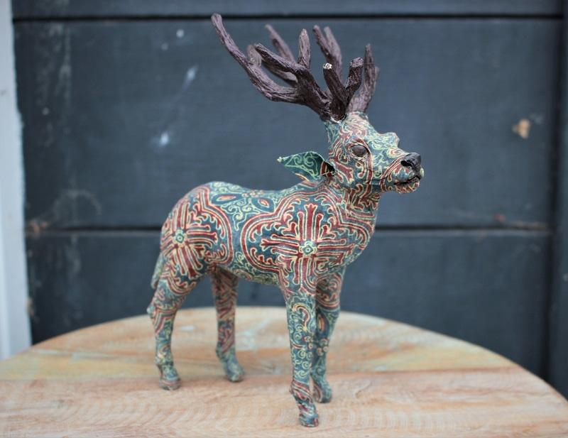 Reindeer Paper Mache With red and green patterned bodies at HomeStreetHome Shop