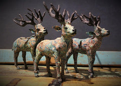 Reindeer Paper Mache Group of 3  With red and green patterned bodies at HomeStreetHome Shop
