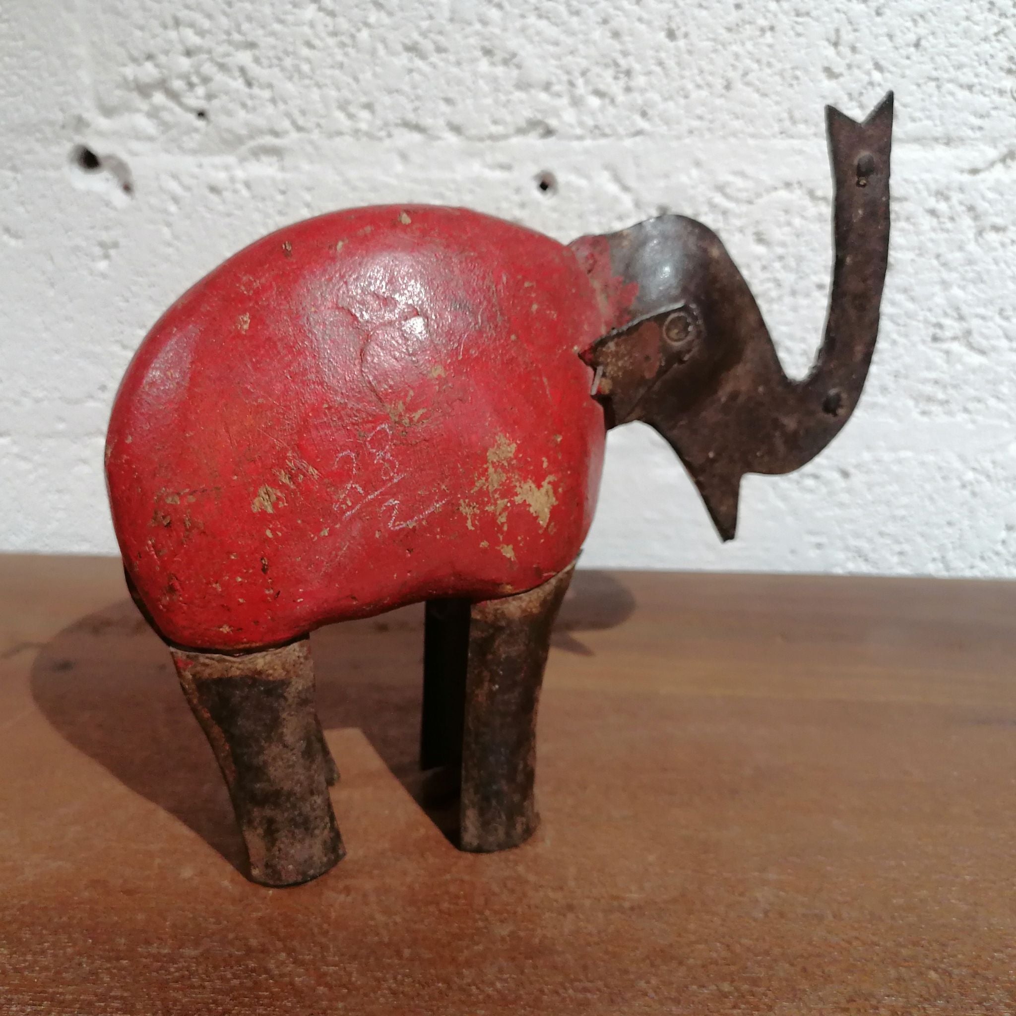 Red Elephant side view of opposite side 