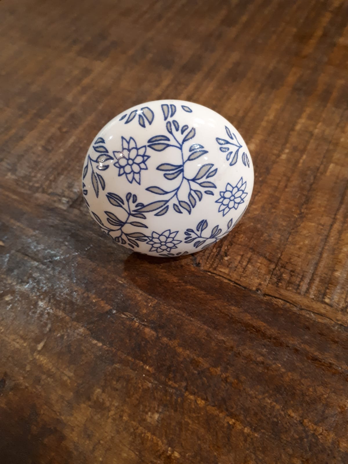 Romantic ceramic knob on a table 