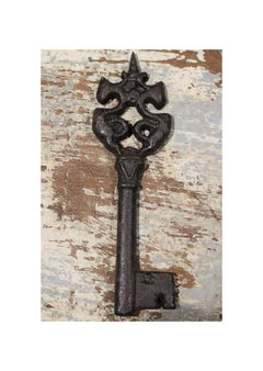 Antique Key Cast Iron With Pattern Top on Reclaimed Wood