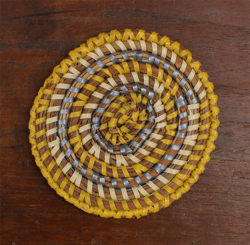 handcrafted set of 12 coaster in basket yellow coaster