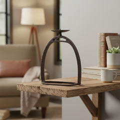 candle holder on a wooden shelf in a living room