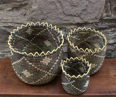 zig zag design basket made out of recycled plastic and straw, black and white