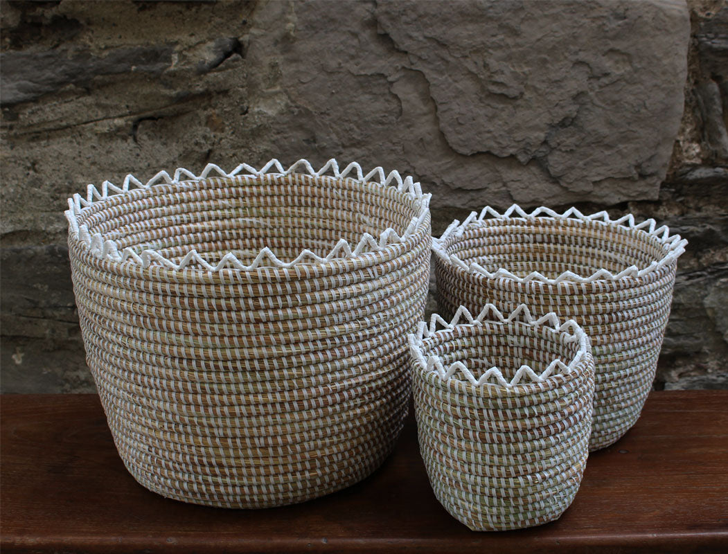 zigzag pattern white basket made out of recycled plastic and straw